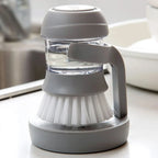 Cepillo Limpiador Con Dispenser de Jabón